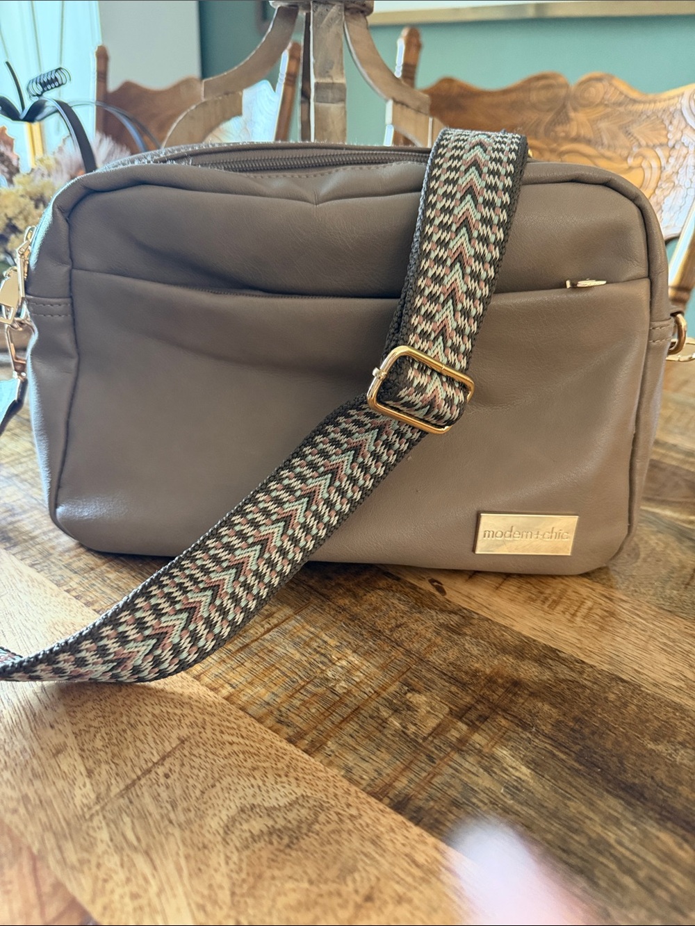 Modern Chic Taupe Leather Crossbody Bag with Patterned Strap
